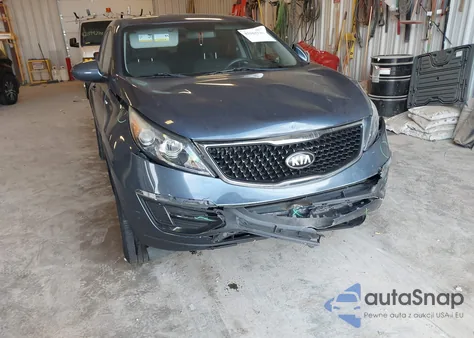 2015 Kia Sportage Lx z USA, uszkodzony, nr VIN KNDPBCACXF7692996